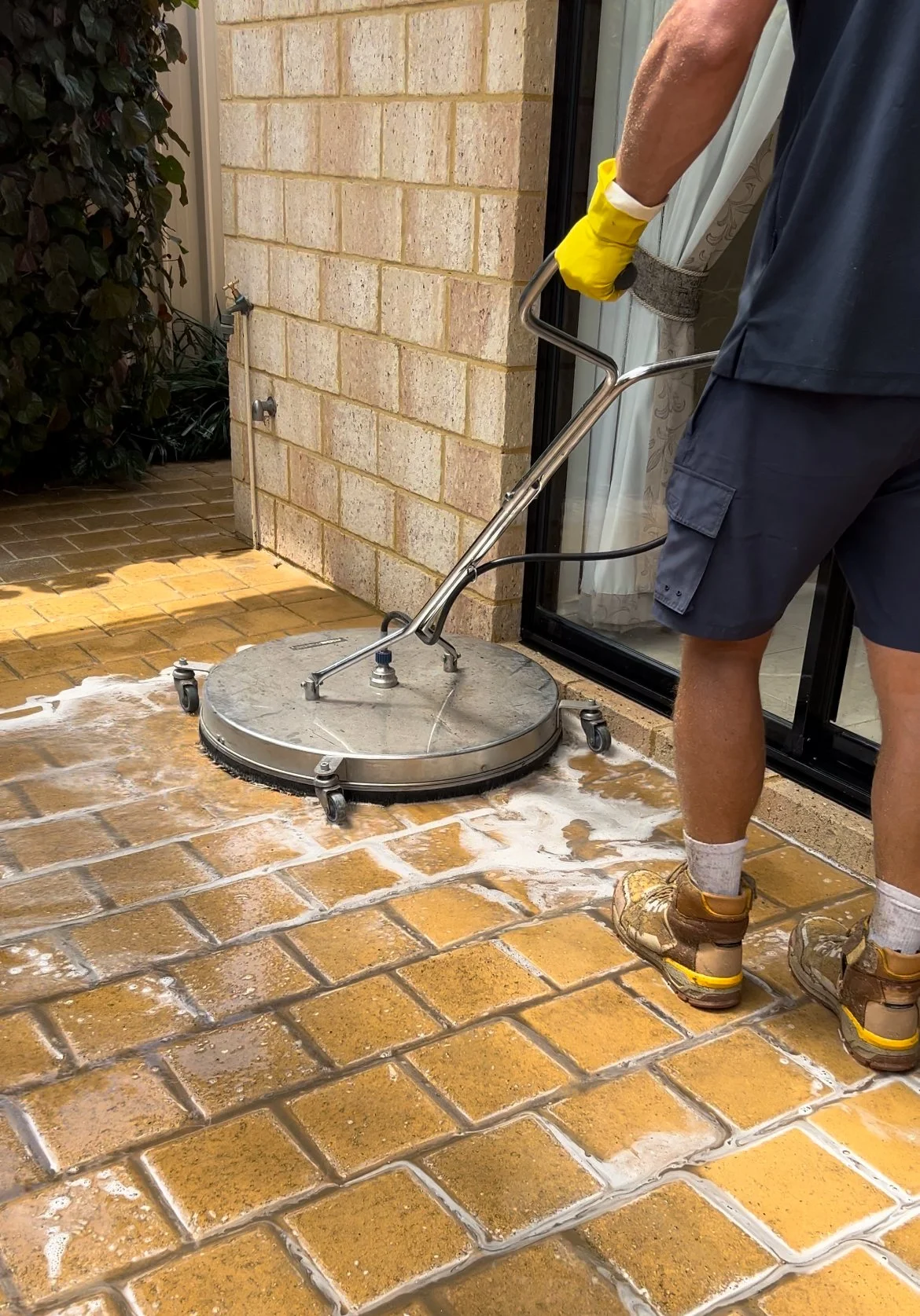 Pressure Cleaning Surfaces with a solution and surface cleaner professionally.
