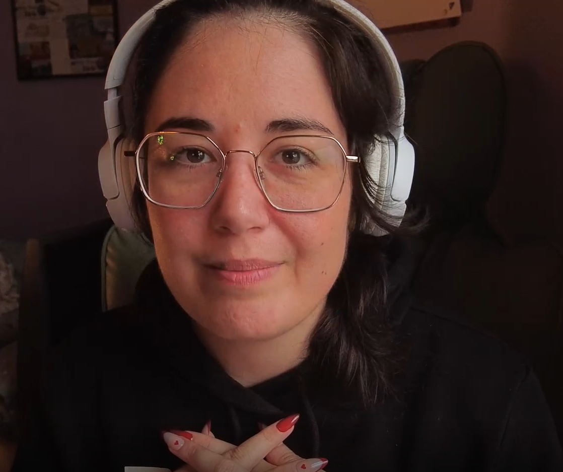 JacPotato wearing white headphoness