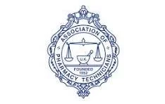 Seal of the Association of Emergency Technicians featuring a balance scale, a cup, and a torch.