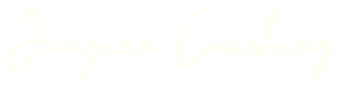 Black background with white handwritten text saying "Jungian Coaching"