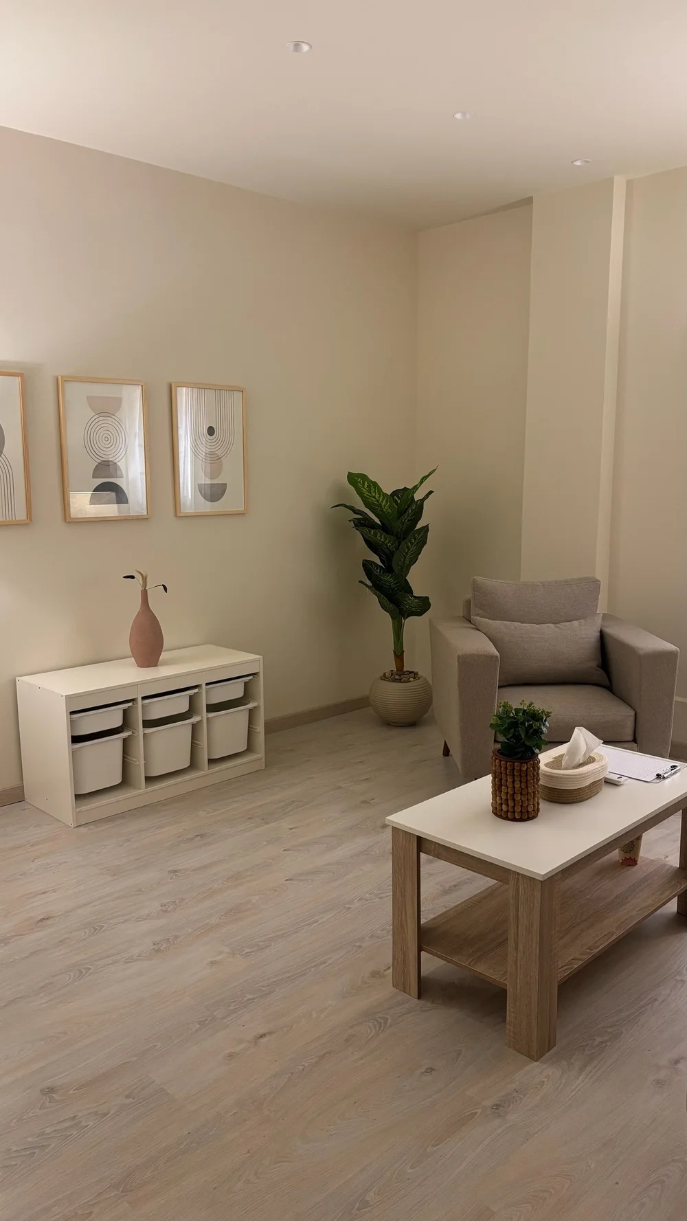 A quiet corner of the centre with plants and warm light