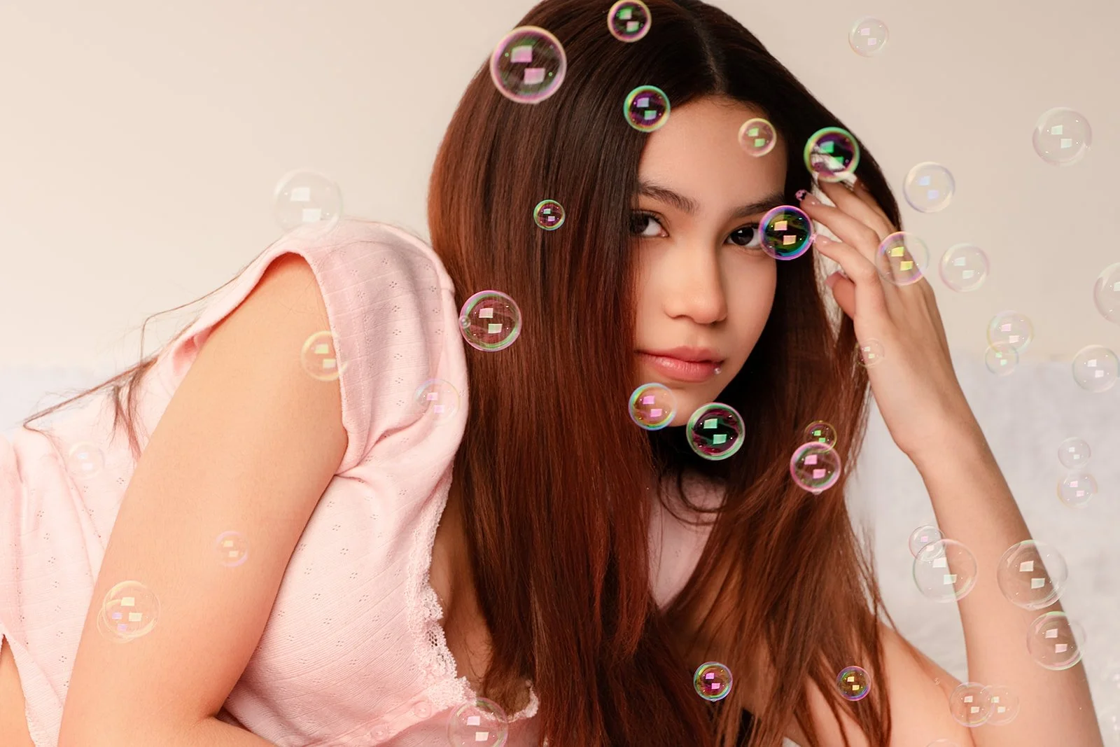 13-year-old model Bella Fierro in a K-Pop inspired branding shoot with floating bubbles at JBS Creative Studio in Georgetown, TX.