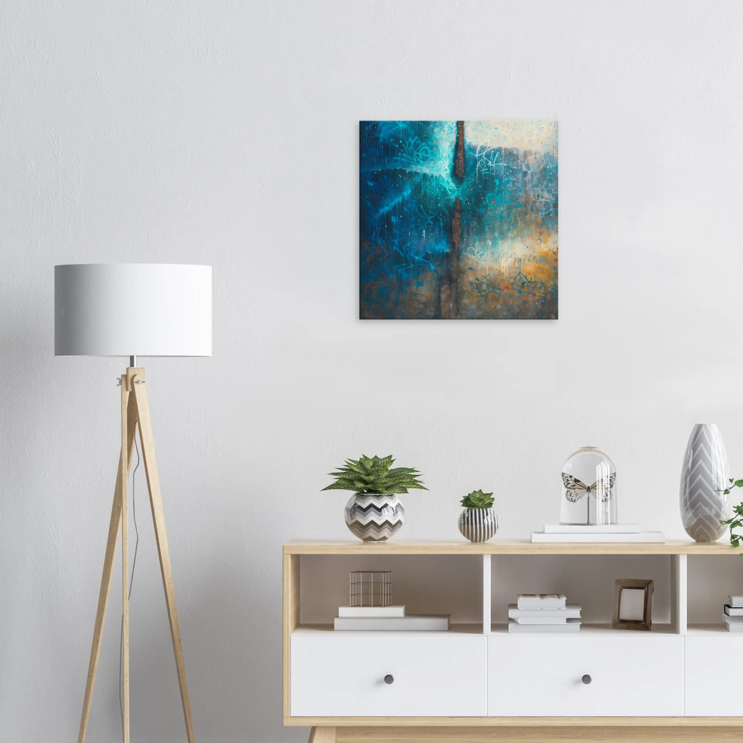 Minimalist living room with a tall white floor lamp on the left, an abstract blue and beige painting on the white wall, a light wood shelf with small potted plants, a butterfly sculpture, books, and small decorative items.