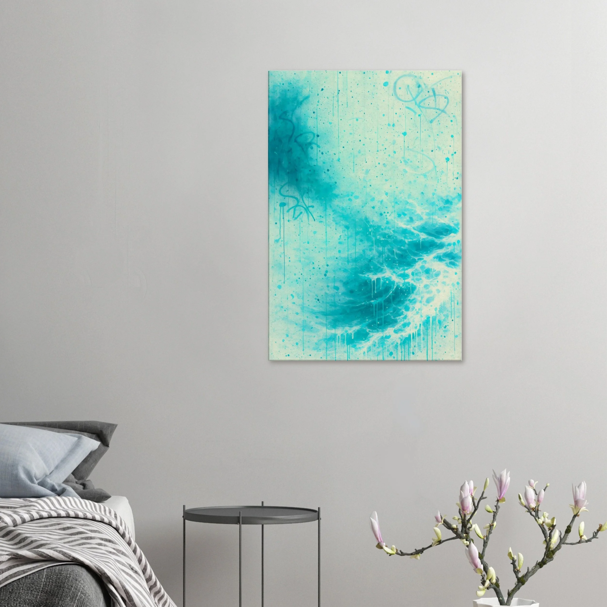 Abstract blue and white street art painting hung on a white wall in a bedroom with a bed, pillow, and a small table.