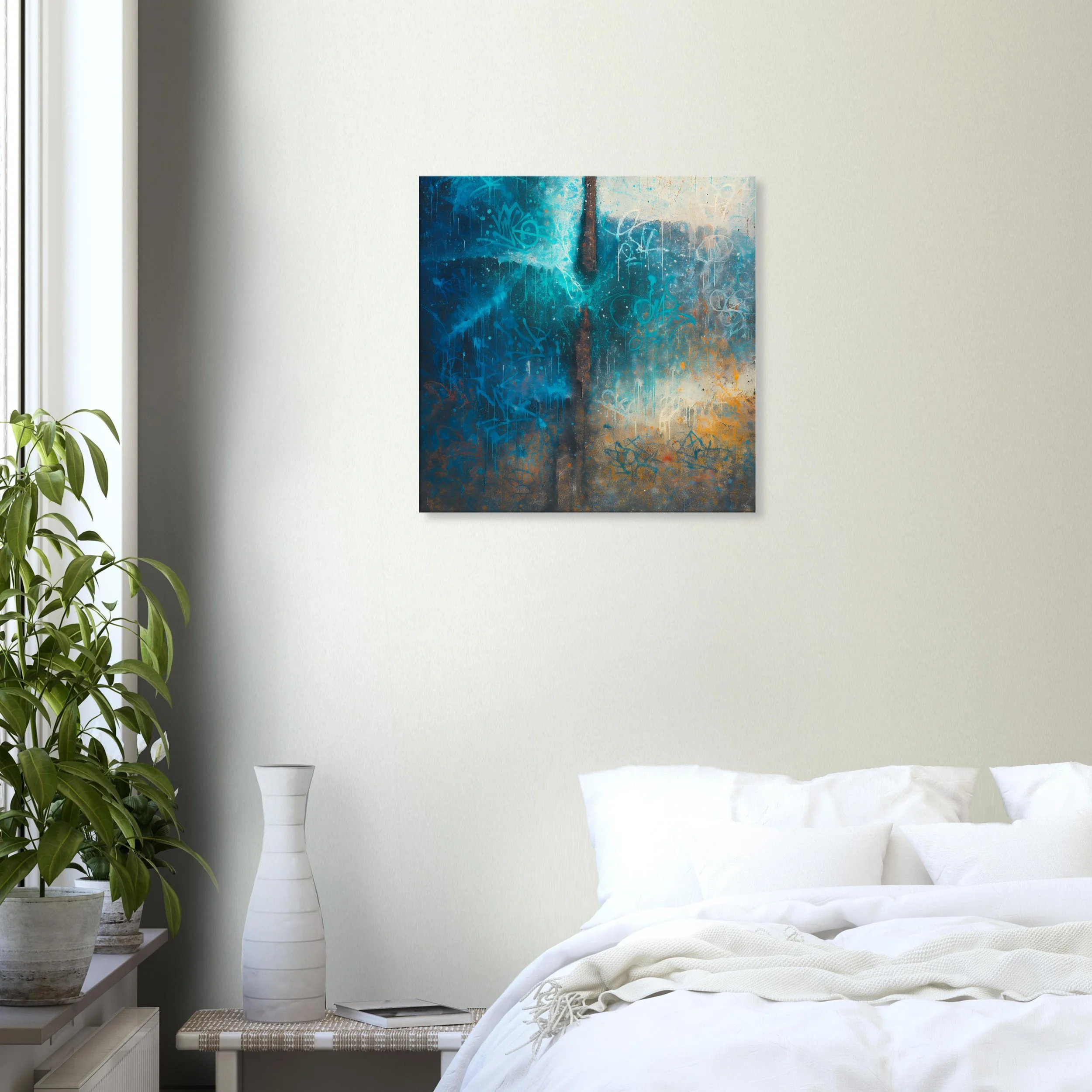 Abstract painting with blue, teal, and orange hues hanging above a white bed with pillows and blanket in a bedroom with a potted plant and a white vase on a side table.