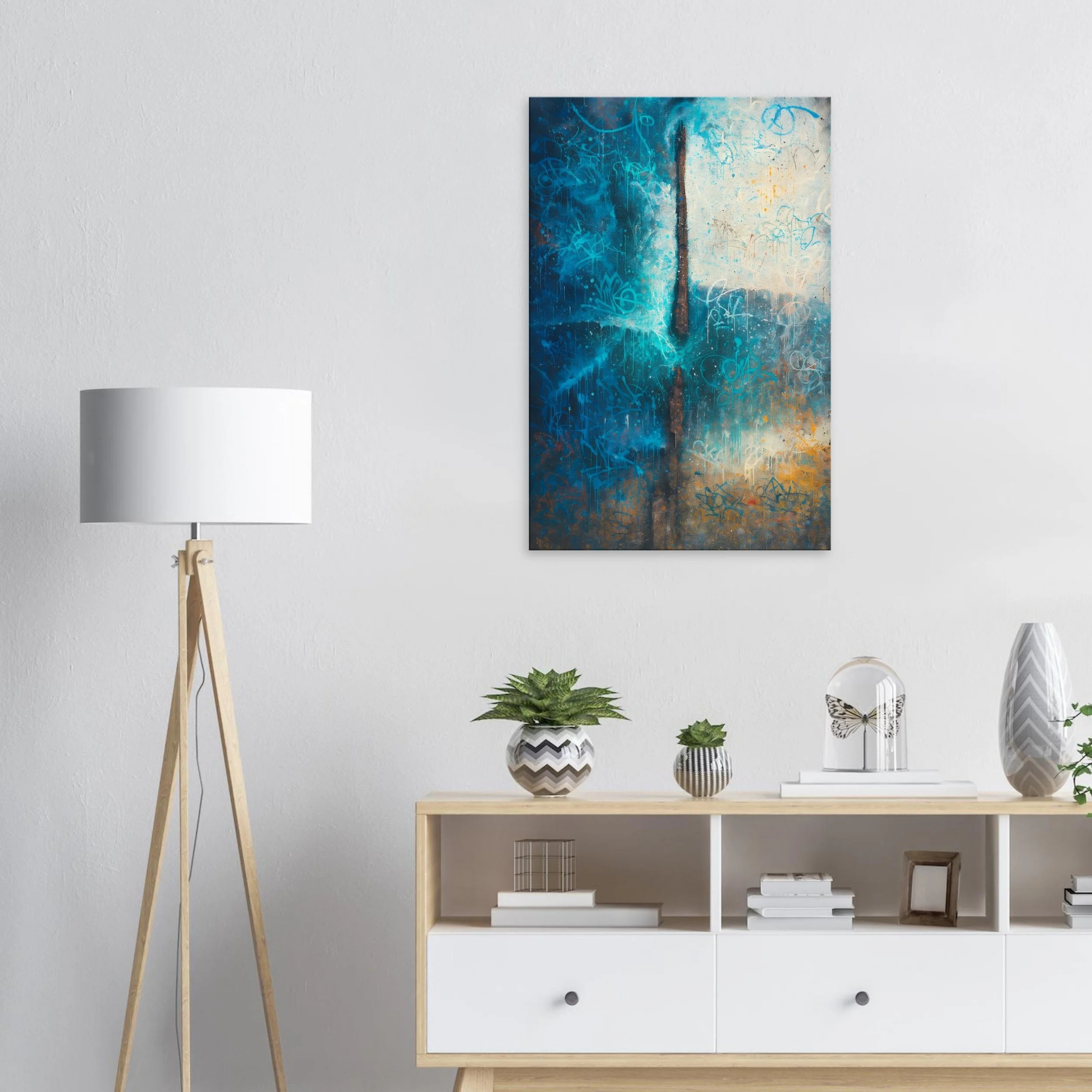 Modern living room with a wooden and white console table decorated with potted plants, books, and a butterfly sculpture, a tall wooden floor lamp with a white lampshade, and a large abstract painting with blue, orange, and cream colors hanging on a w