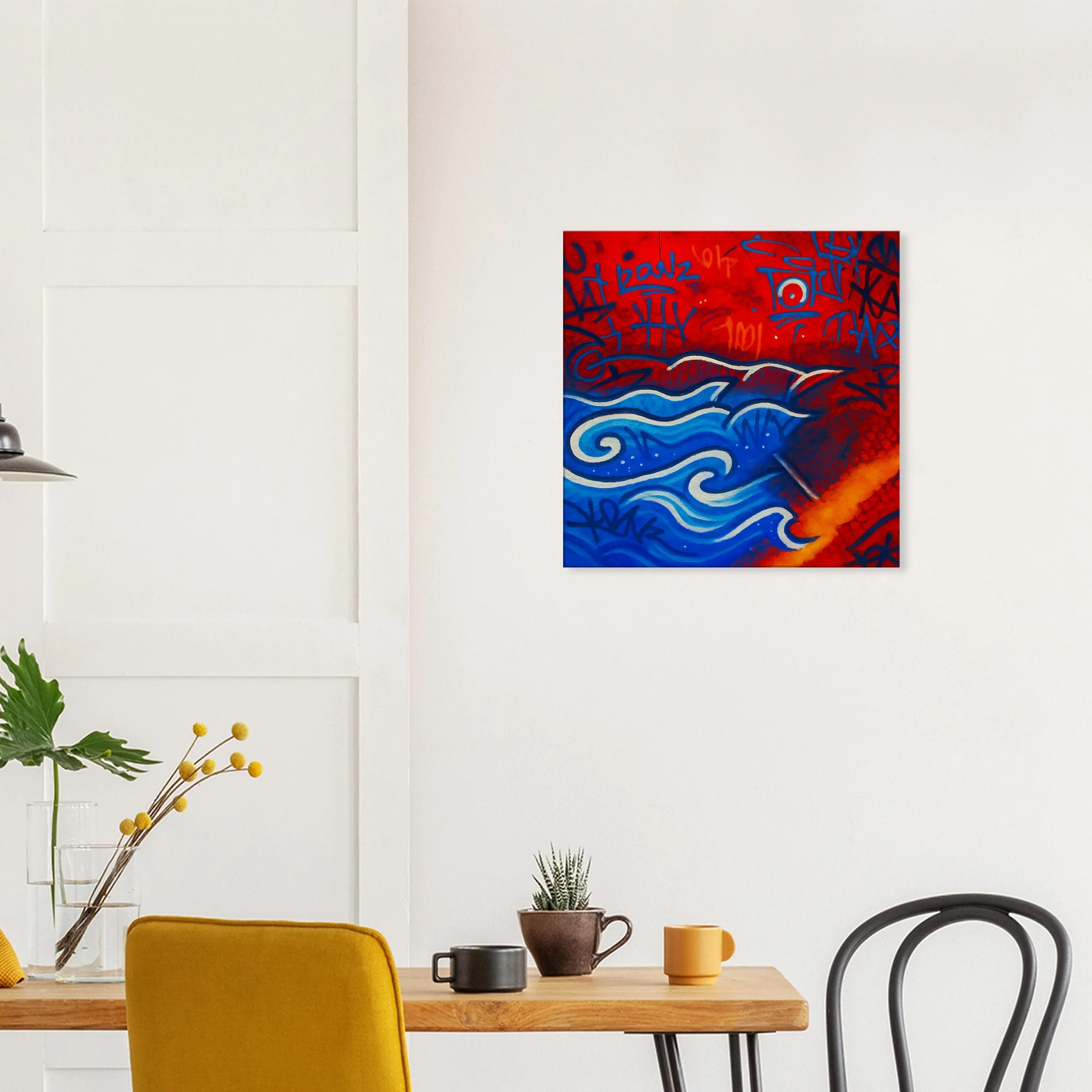 Colorful abstract painting on a plain white wall in a modern dining room, with yellow and black chairs and green plants.