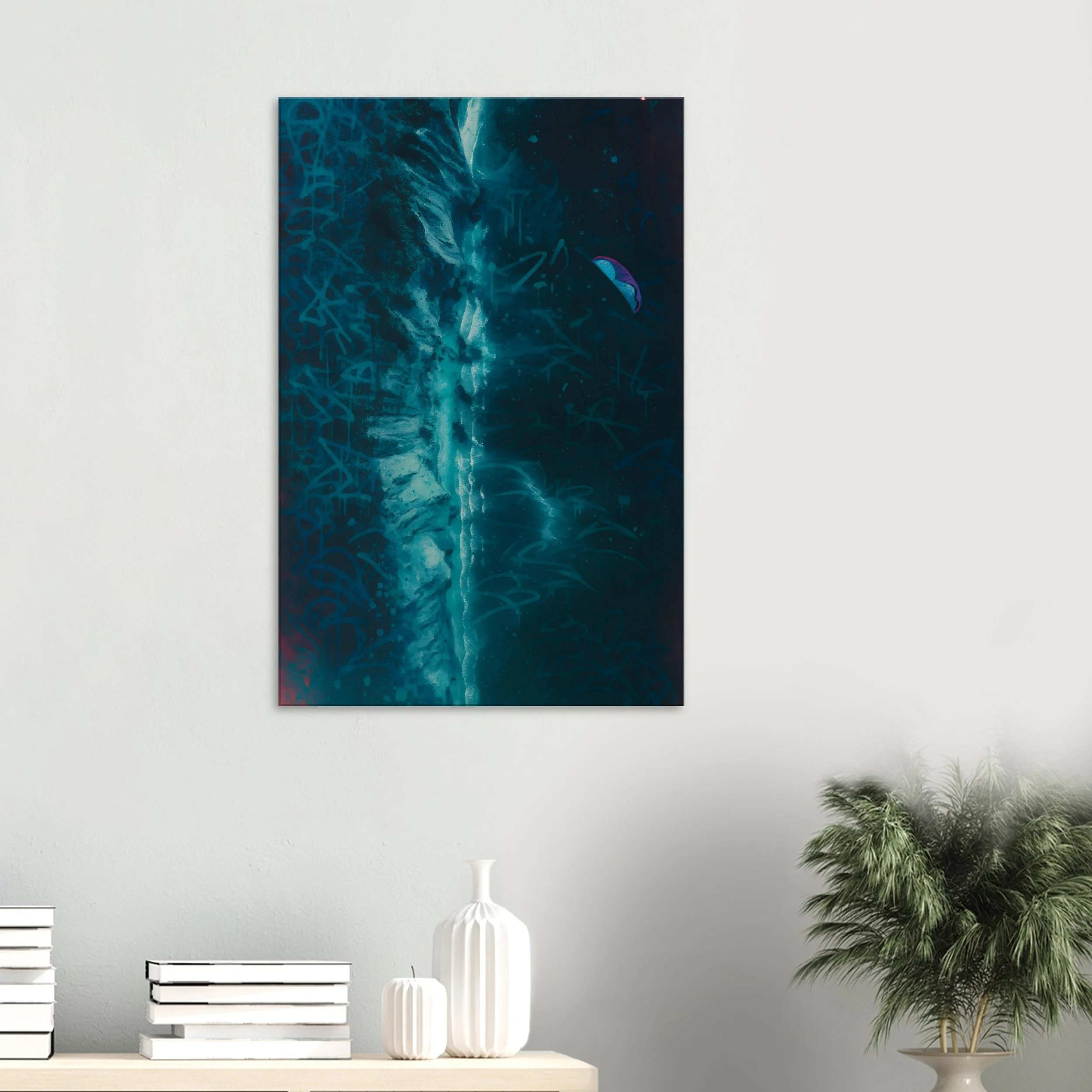 Abstract blue painting with graffiti elements, featuring a space-like scene with a small flying object and a face profile on a white wall in a modern living room.