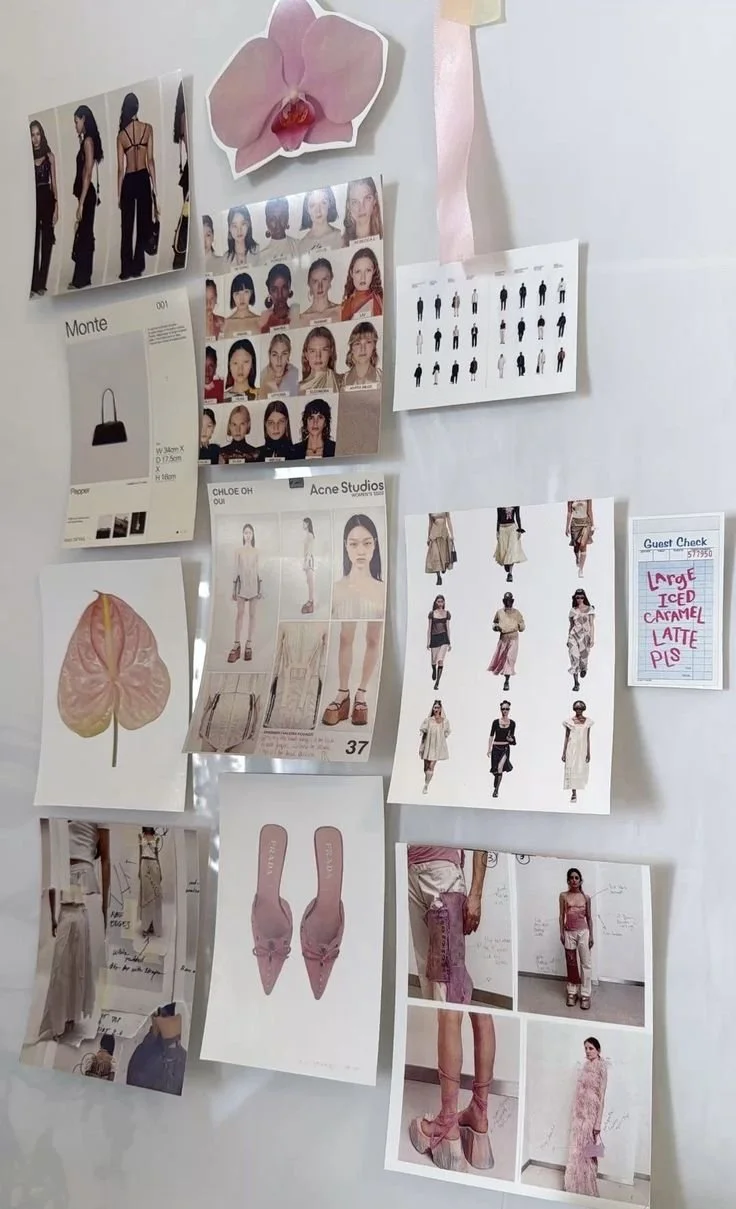 Fashion mood board with photos of models, clothing sketches, fabric samples, and notes, decorated with a large pink flower sticker and pink ribbon.