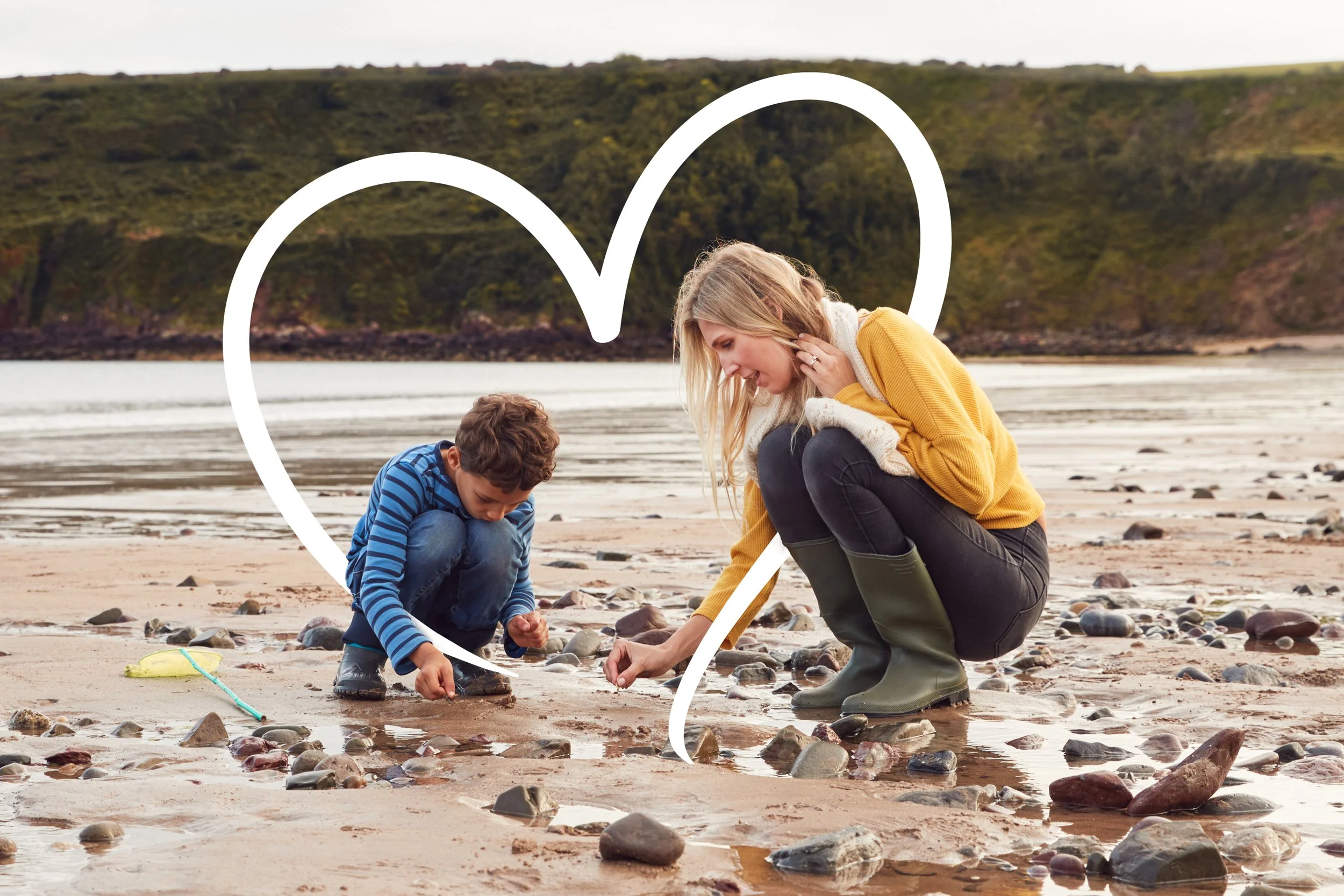 family-looking-in-rockpools-on-winter-beach-vacati-2022-02-02-04-50-38-utc copy.jpg