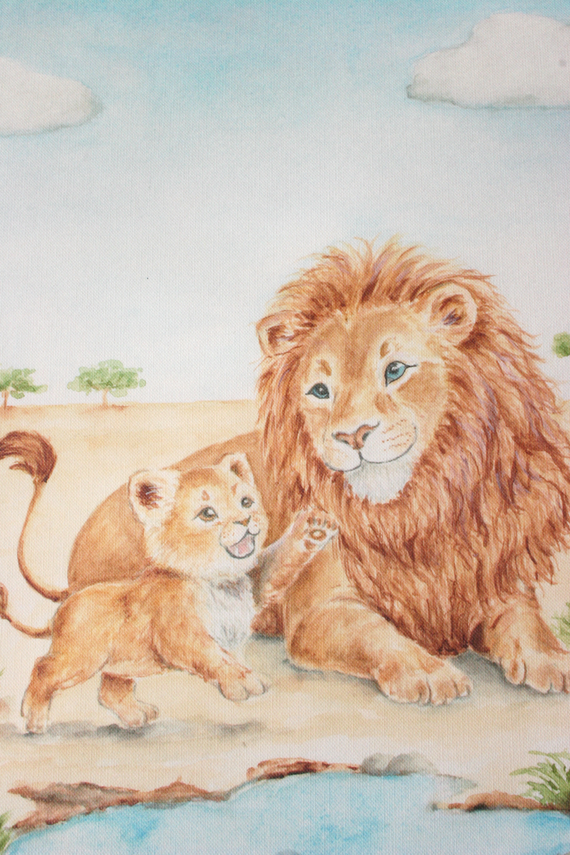 Close-up detail of a hand-painted watercolour lion and cub illustration showing the soft textures and warm earthy tones.