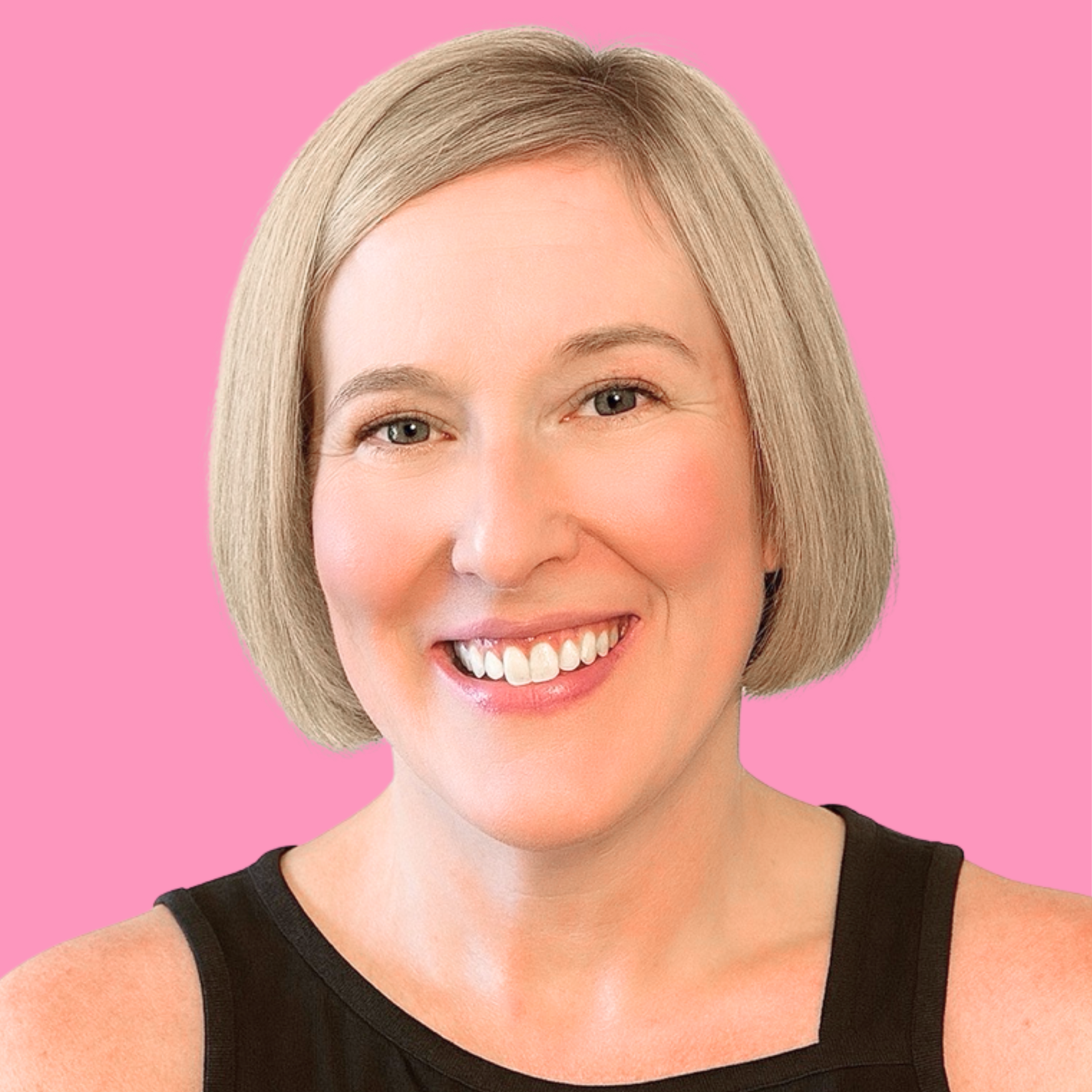 A woman with short blonde hair smiling, wearing a black sleeveless top, against a pink background.