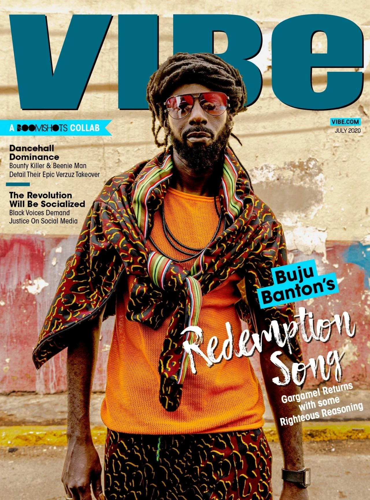 Magazine cover featuring Buju Banton wearing an orange athletic shirt, a multi-colored scarf, and sunglasses, standing in front of a weathered wall with graffiti. The cover includes headlines about dancehall music, social justice, and Buju Banton's s