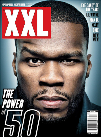 Close-up of a man's face on the cover of XXL magazine, featuring a serious expression, short haircut, and beard.