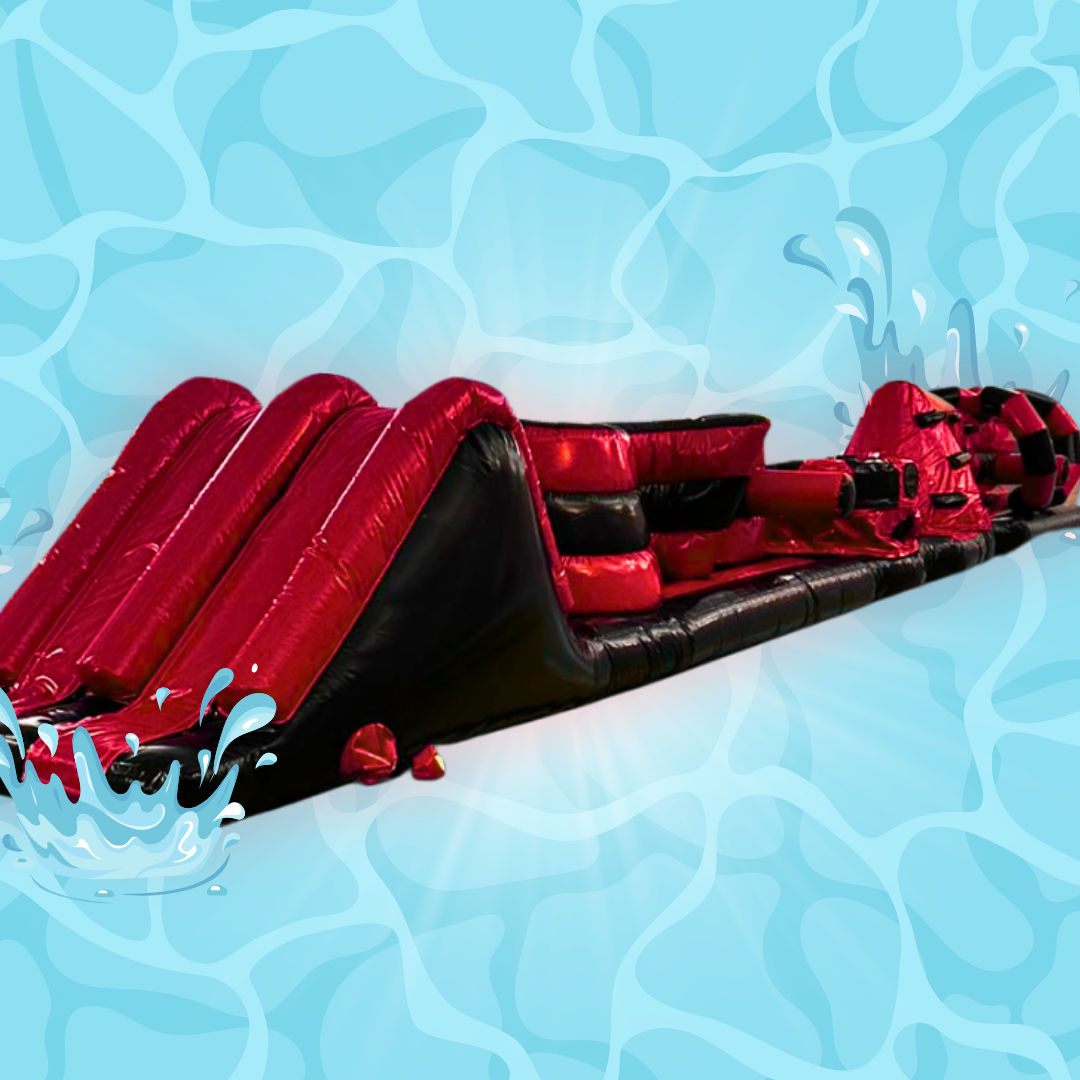 Red and black inflatable slip and slide on a poolside background.