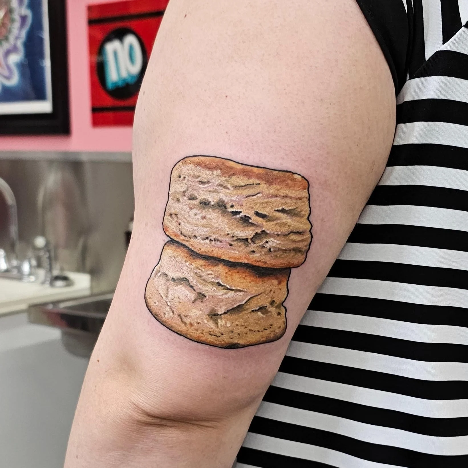A hyper-realistic stack of two flaky biscuits is rendered with soft shading and warm, toasted browns. The playful concept and convincing texture give the piece a humorous yet surprisingly detailed aesthetic.