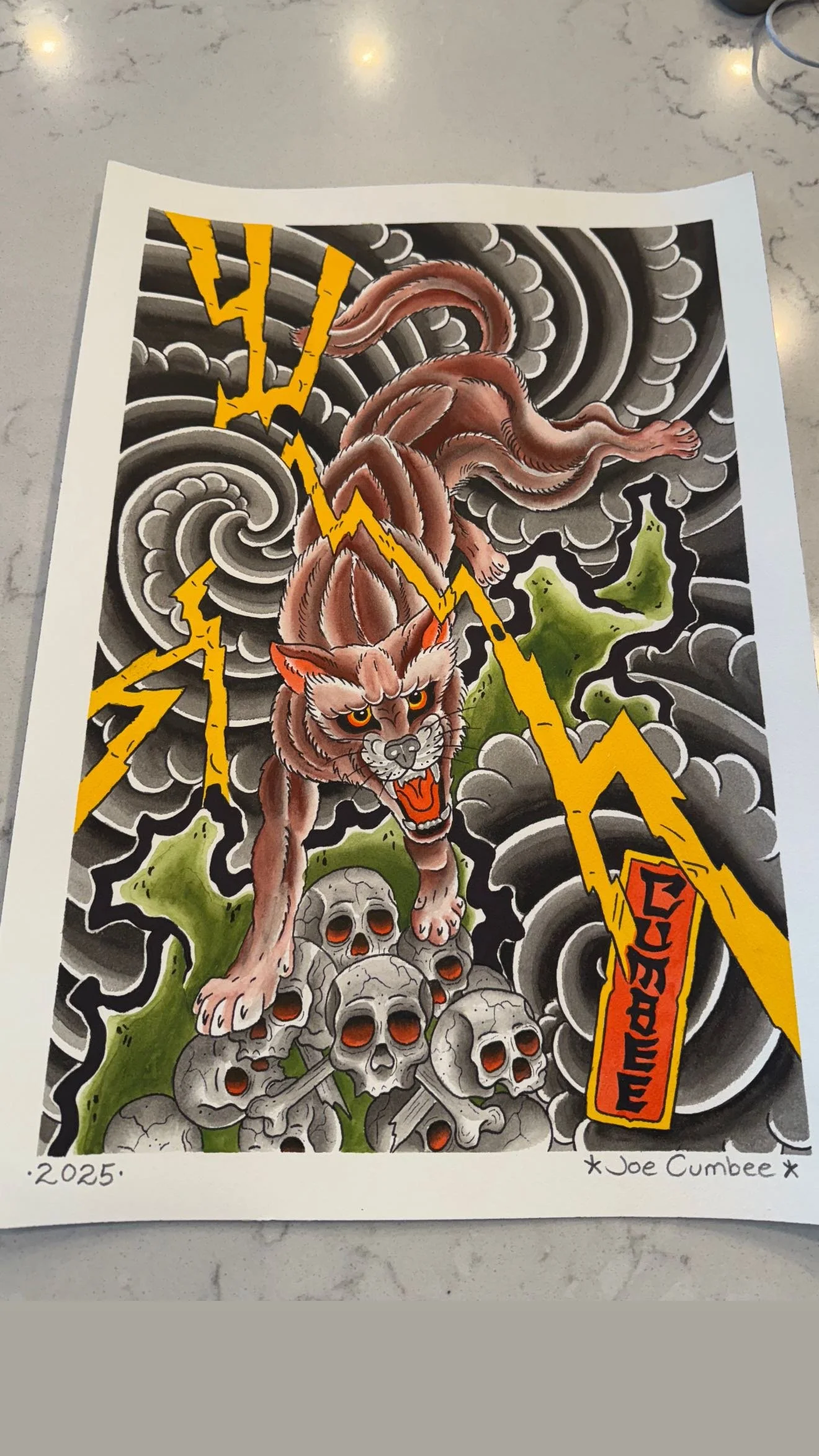A colorful tattoo-style illustration of a fierce snarling wolf standing on a pile of skulls, with dark swirling clouds and yellow lightning bolts in the background. The word 'MERCY' is written in red on one of the lightning bolts. The artwork is signed 'Joe Cumbee' and dated 2025.