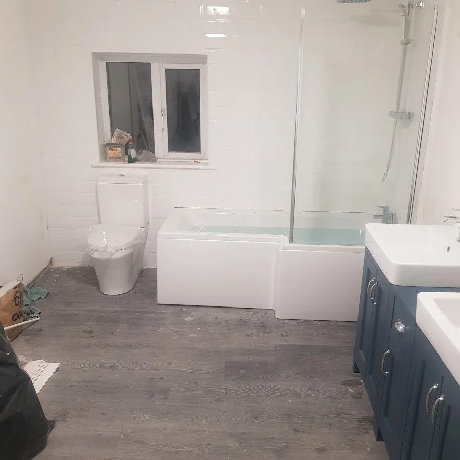 BATHROOM FINAL FINISH (WC, basin, flooring) - Final bathroom works completed as part of a private bespoke bathroom upgrade, including sanitary ware installation and durable flooring to client's standards.
