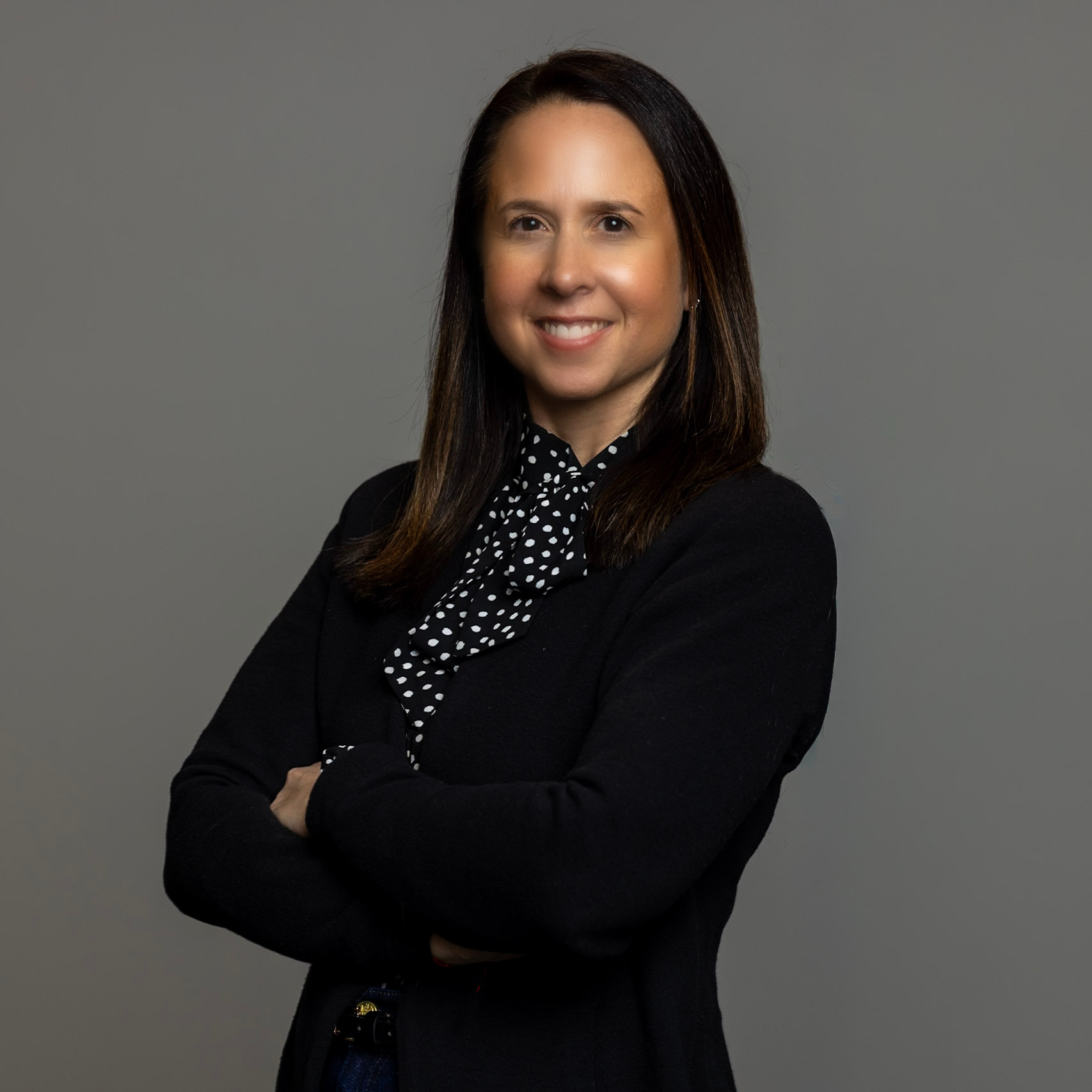 sara miller in dark suit 
