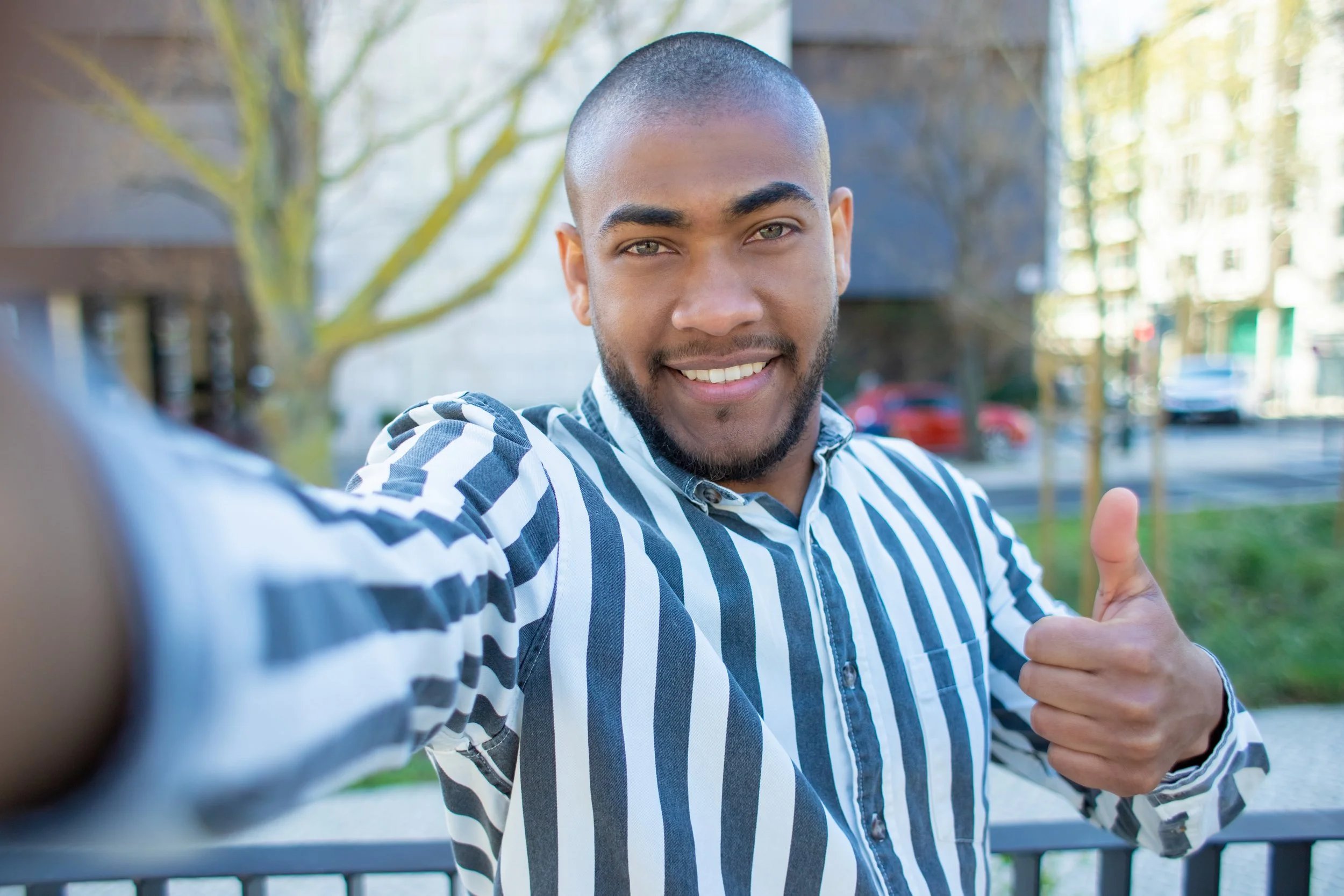 handsome-smiling-african-american-man-showing-thumb-up.jpg