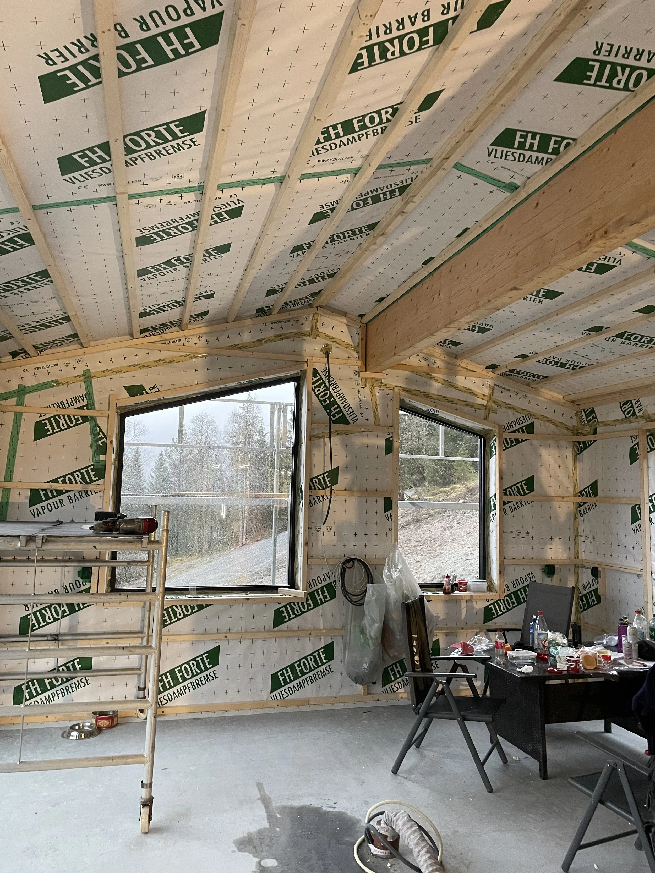 Blåseisolering av  ny einebustad