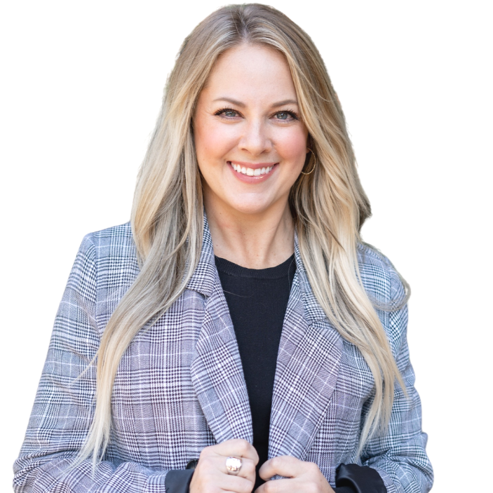 Smiling blonde woman in checkered blazer and black top against white background.