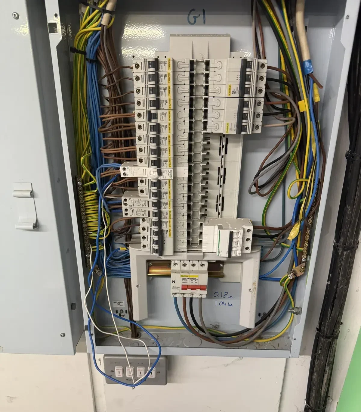 Electrician carrying out EICR testing and electrical inspection in Wellingborough