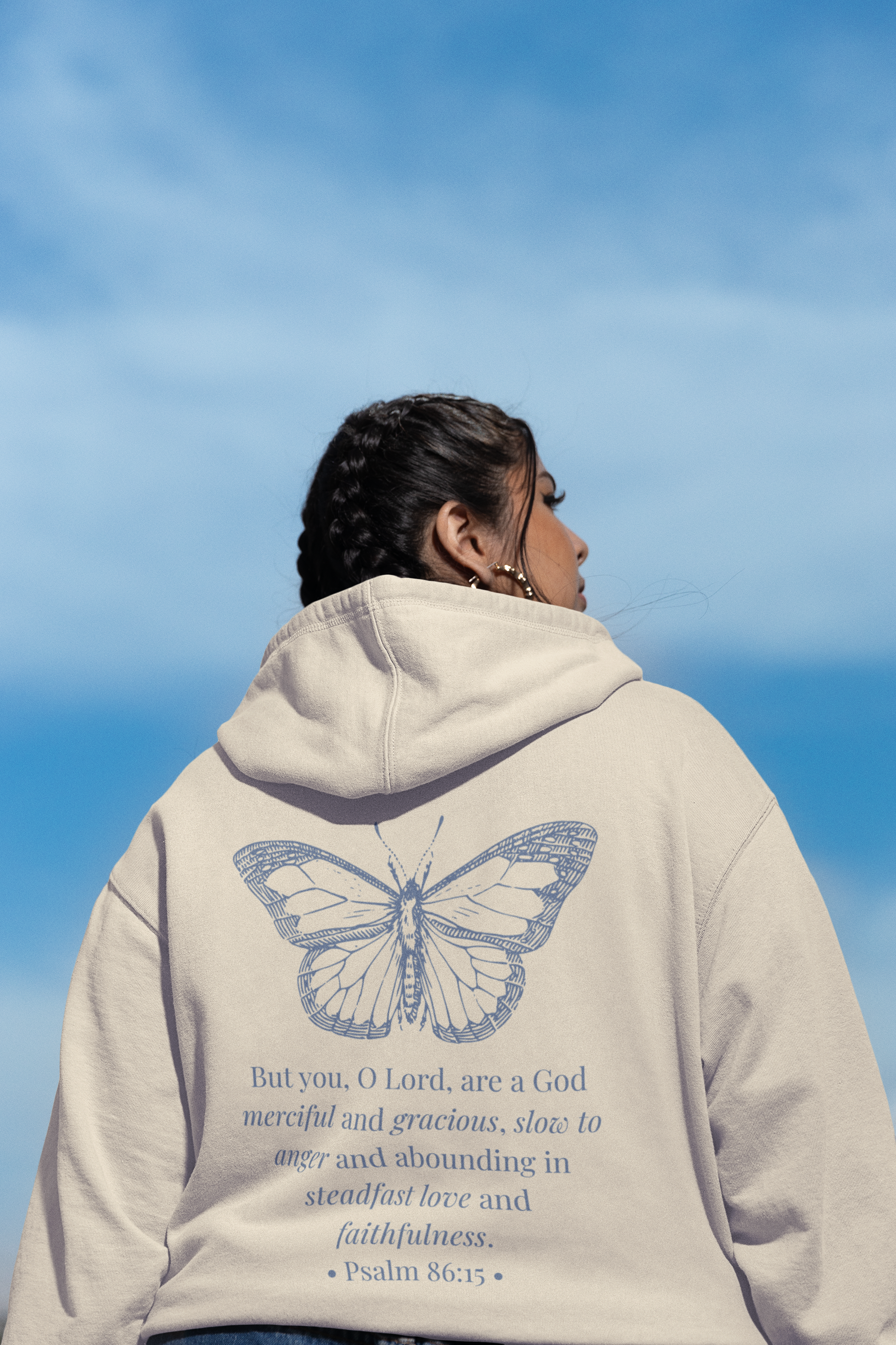 back-view-hoodie-mockup-of-a-serious-latin-woman-posing-outdoors-m36821.png