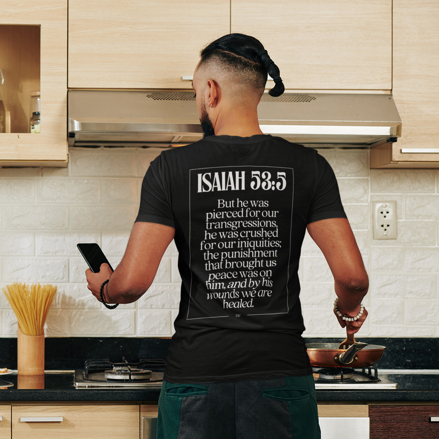back-view-tee-mockup-of-a-man-cooking-a-meal-at-home-m4208-r-el2.png