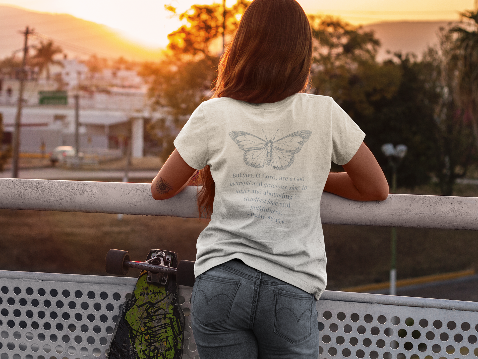 t-shirt-mockup-of-a-skater-girl-watching-the-sunset-8922a.png