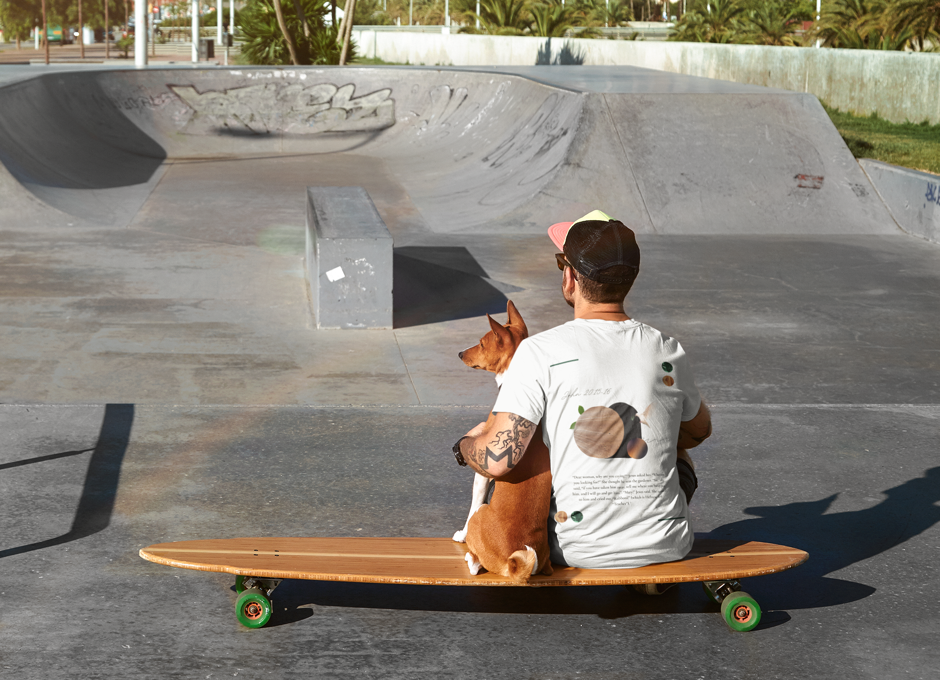 back-view-t-shirt-mockup-of-a-skater-hugging-his-dog-m6371-r-el2.png