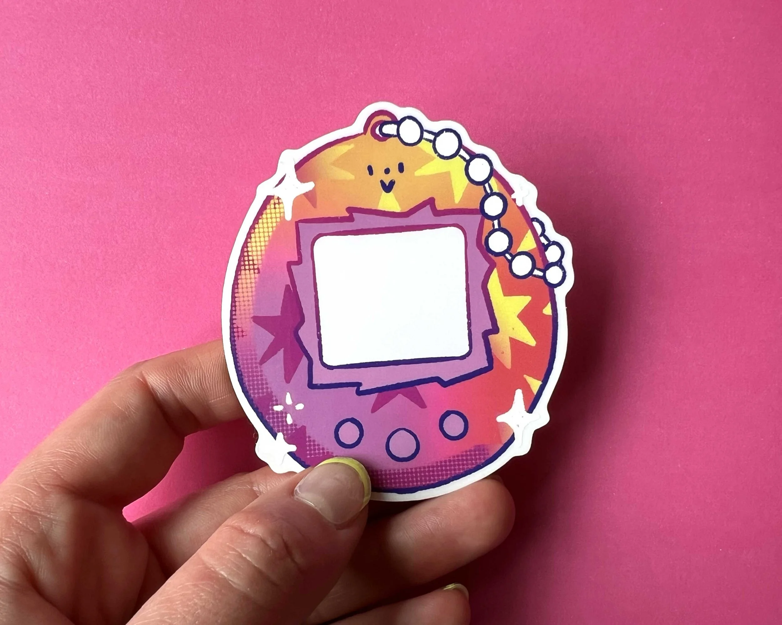 Brightly coloured, illustrated, tamagotchi style vinyl sticker with transparent window for pet photos. 90s retro, pet lover gift ideas