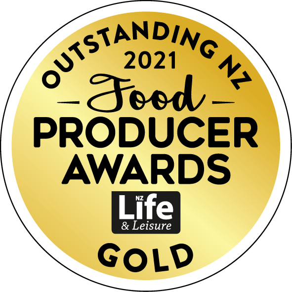 Gold circular award badge for the 2021 Outstanding NZ Food Producer Awards by NZ Life & Leisure with black and white text.