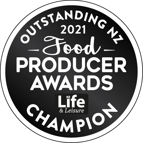 A circular logo for the 2021 Outstanding NZ Food Producer Awards by NZ Life & Leisure, with text emphasizing the champion status.