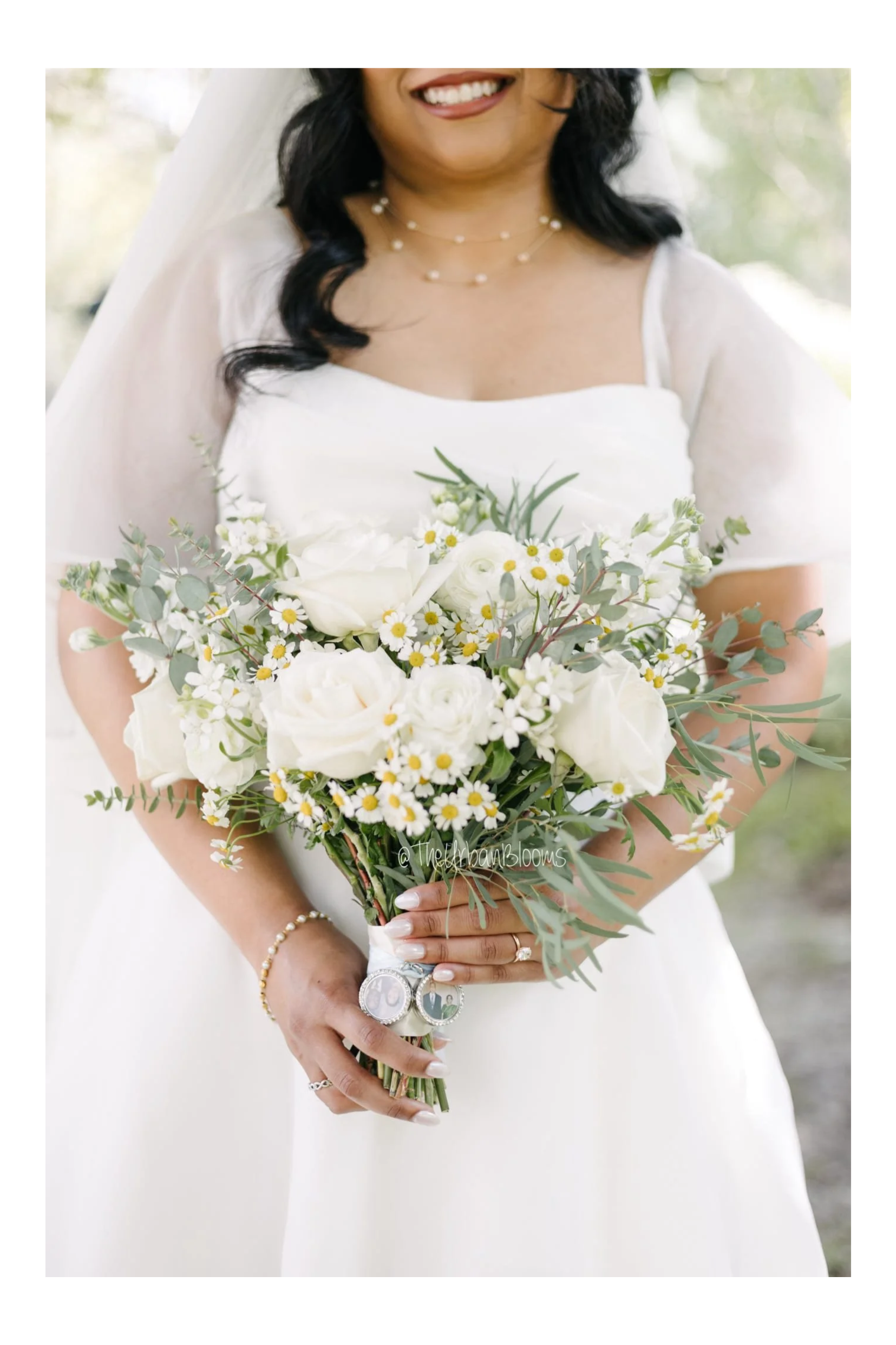 Bridal bouquet of fresh flowers made with chamomile and ranunculus