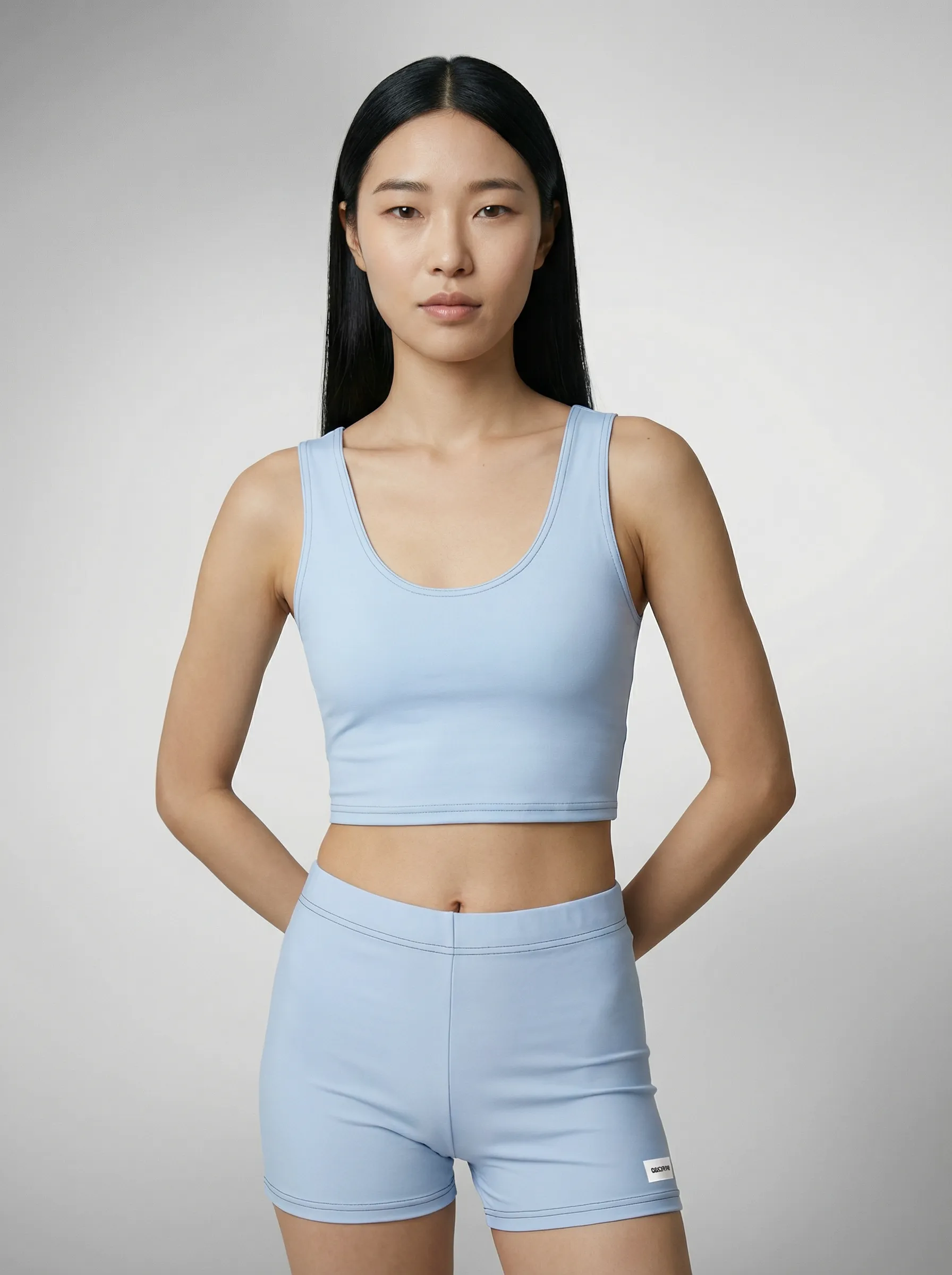 all-over-print-crop-top-white-front-6989a91143b90_american_arms_behind_63152.png