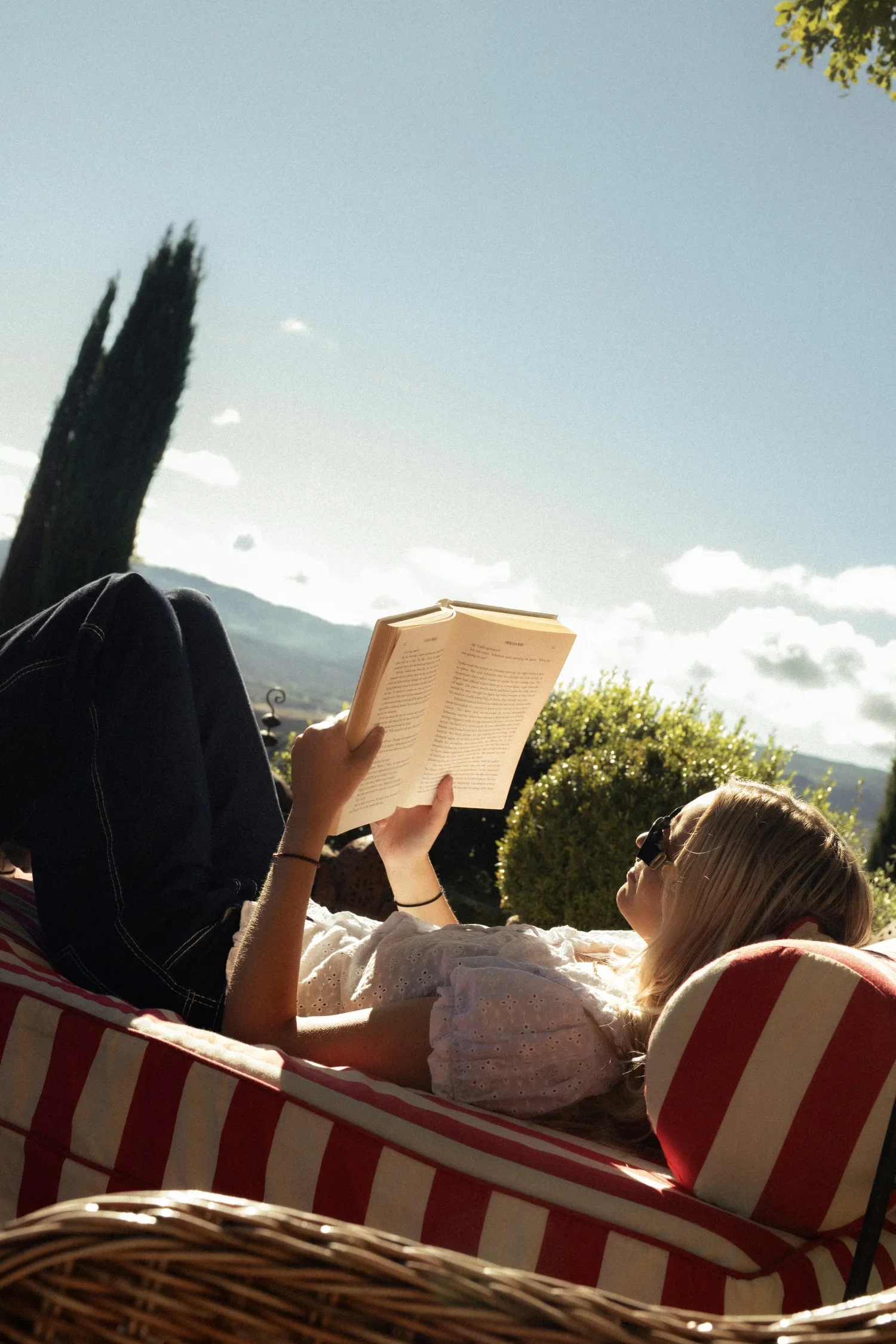 Reading a book by Dominika Radomska