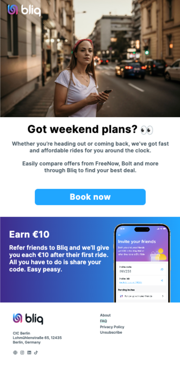 A young woman with long hair, wearing a white T-shirt and a red headband, holding a phone in her right hand, standing on a city street at dusk, with buildings and cars in the background.