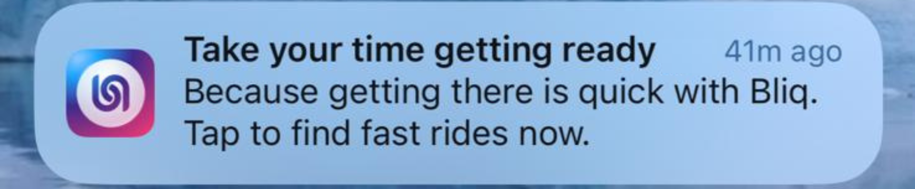 Notification from the Lyft app encouraging the user to take their time getting ready, emphasizing the quick service with Lyft, and prompting to find fast rides.