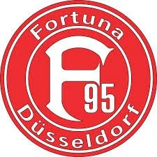 Red circular logo with white text and design, featuring a large letter 'F' and the number '95' in the center, with the words 'Fortuna Düsseldorf' surrounding the logo.