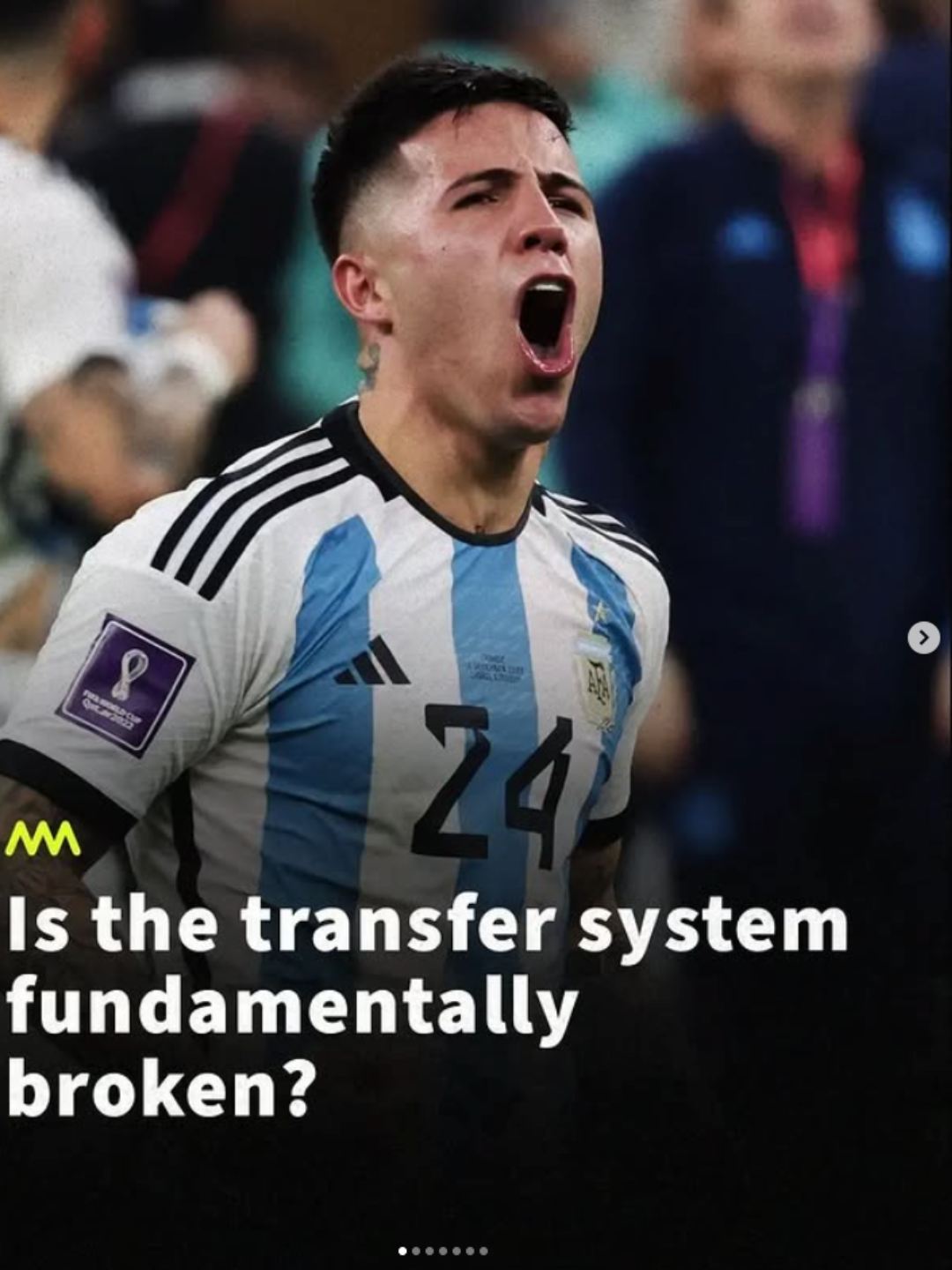 A soccer player wearing an Argentina national team jersey with the number 24, shouting or celebrating, on a soccer field, with text that reads 'Is the transfer system fundamentally broken?'