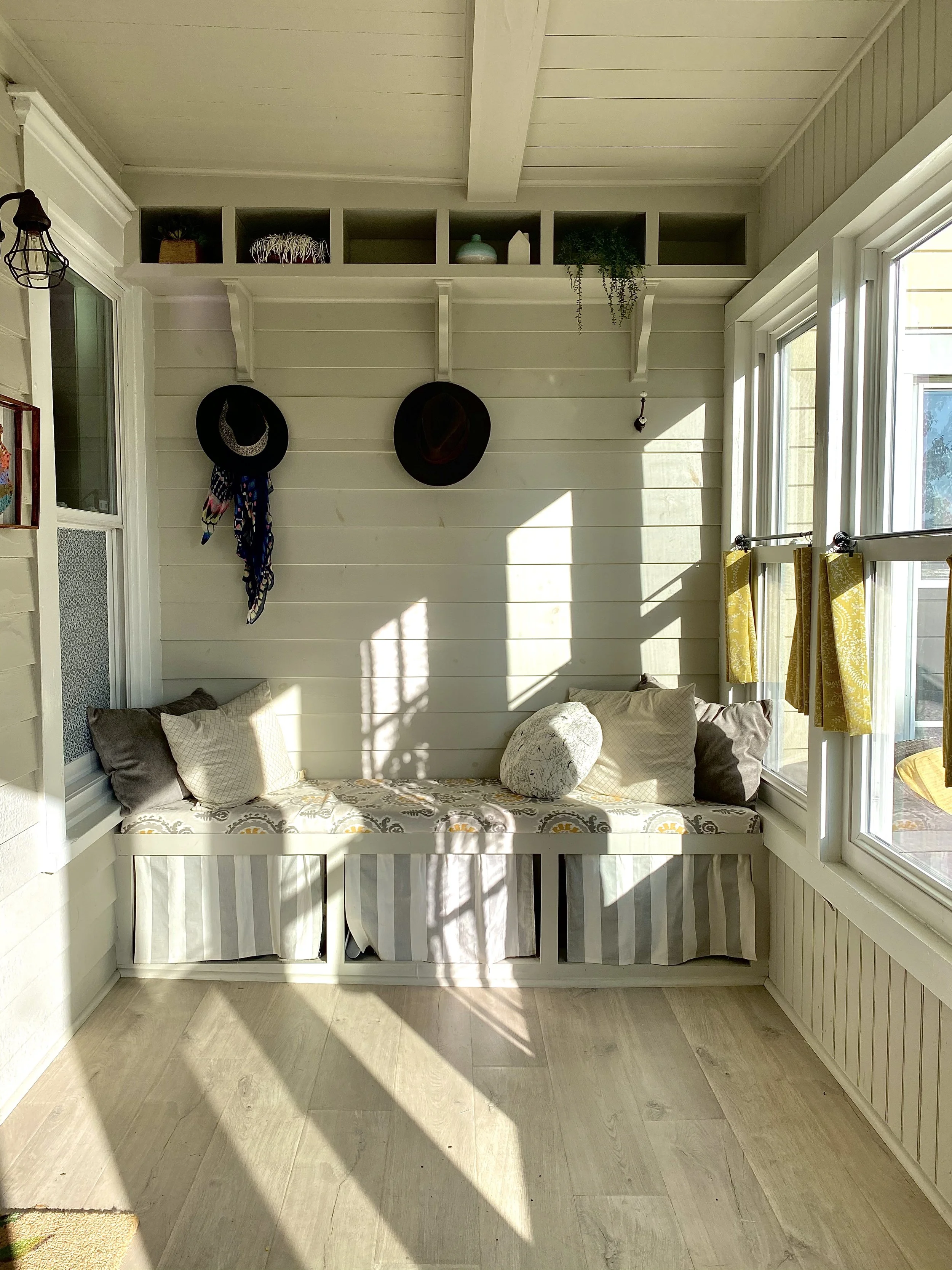A warm, lived in and inviting mudroom in the Hudson Valley