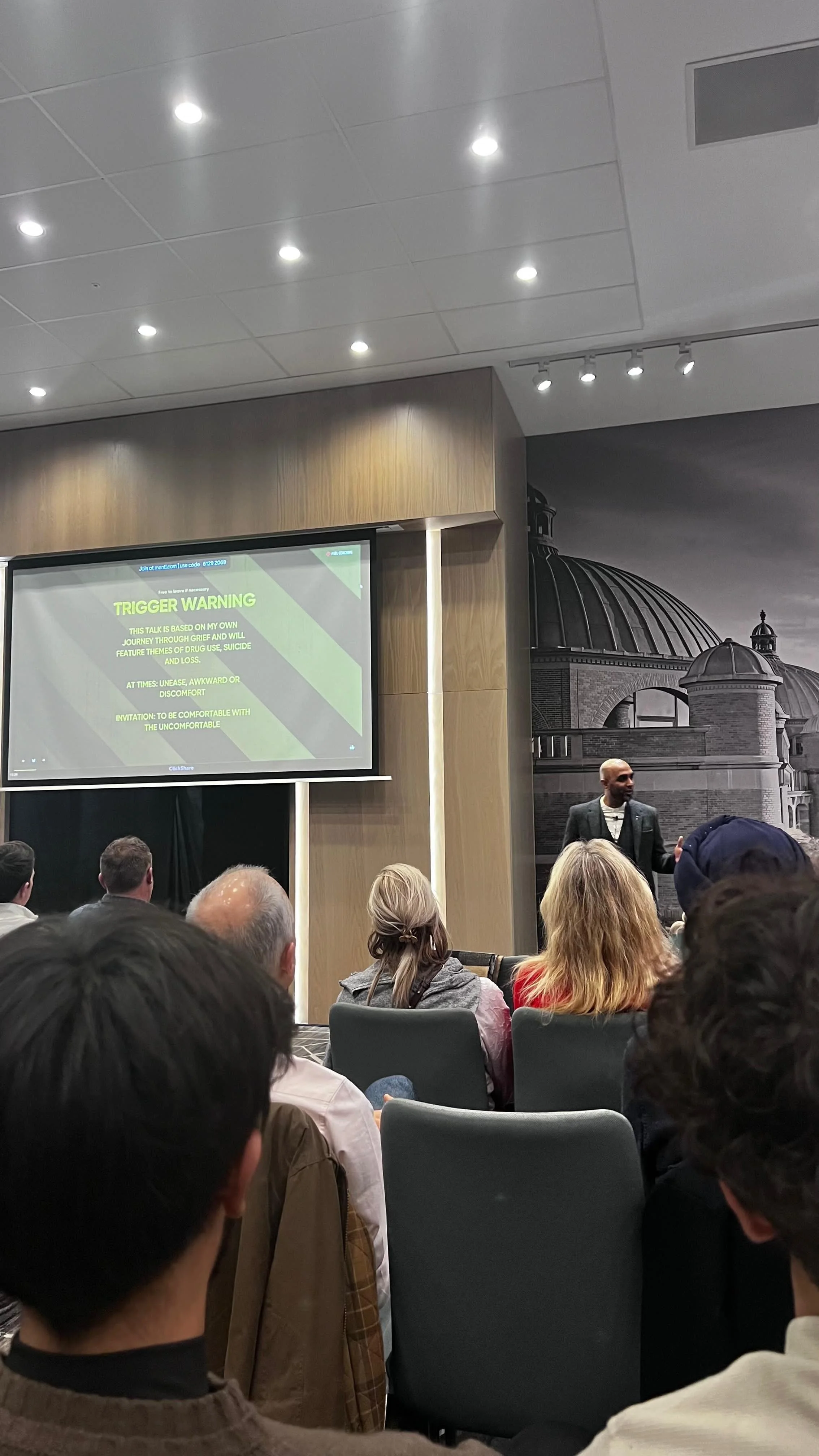 Jesal speaking on wellbeing for dentists at a Wellbeing Conference dedicated to Birmingham University lecturer who passed away