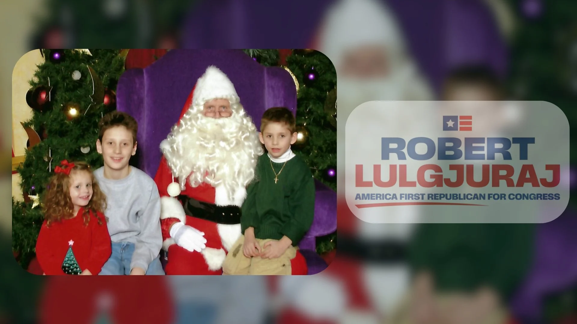 Children sitting with Santa Claus in front of a decorated Christmas tree, with a campaign sign for Robert Lulgjuraj, Republican candidate for Congress.