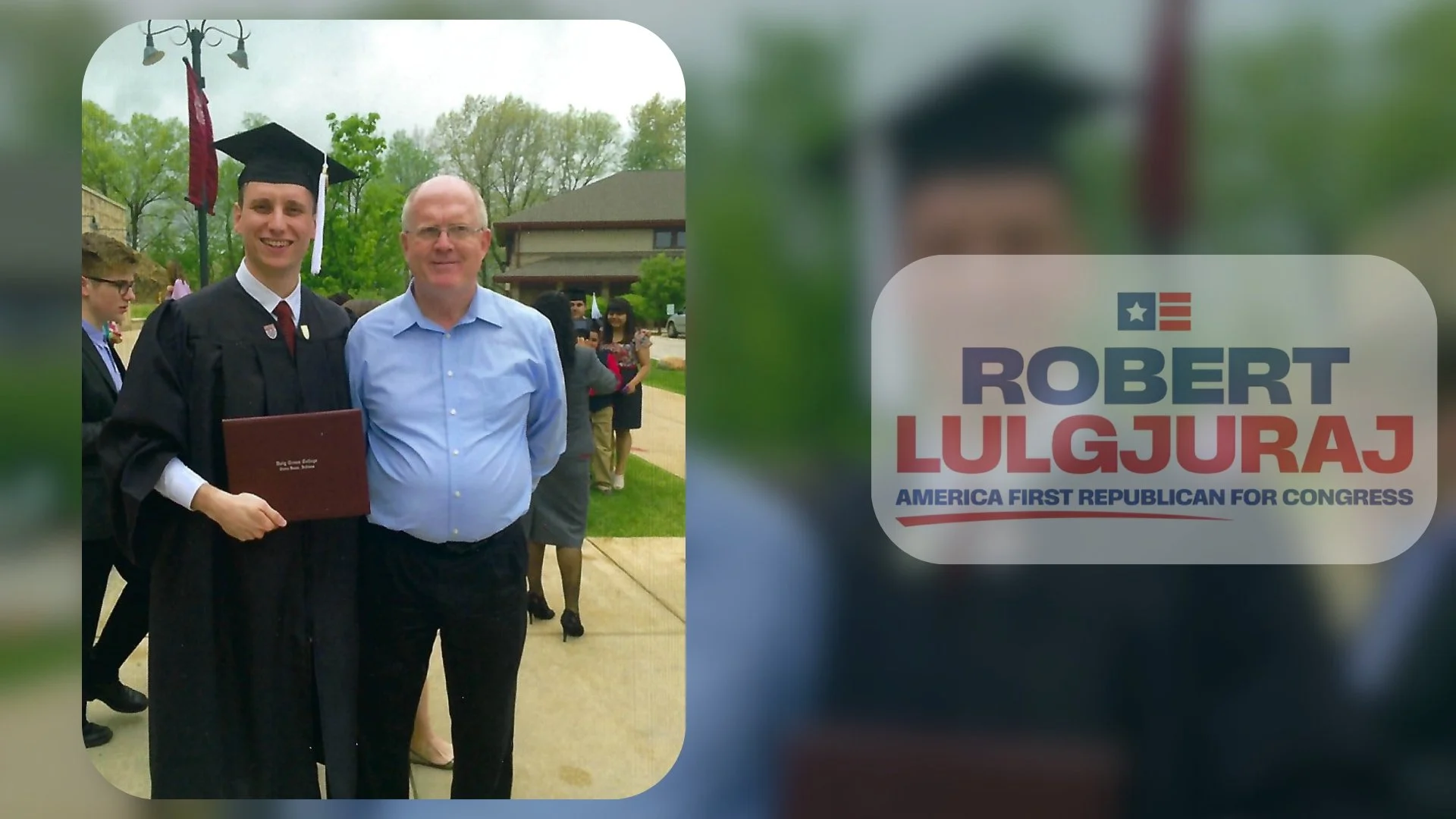 A young man in a black graduation gown and cap holding a diploma standing next to a man in a light blue shirt at an outdoor graduation ceremony with people and a building in the background. The scene is overcast and the setting appears to be a school