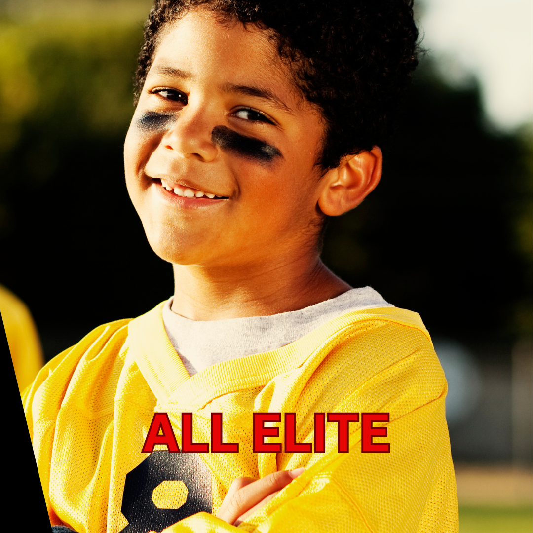 A young boy with curly hair, black eye paint, and a bright smile wearing a yellow sports jersey, with the text 'ALL ELITE' in red at the bottom.