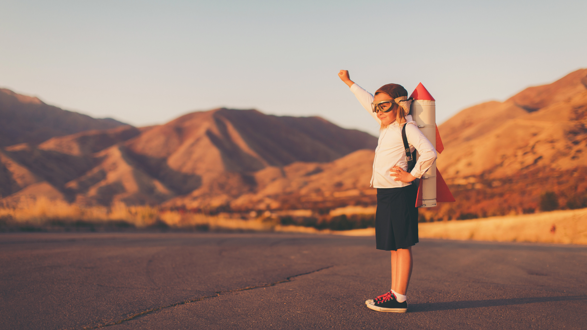 Girl celebrating success and showing that every dream can become a reality with her go-get-them attitude