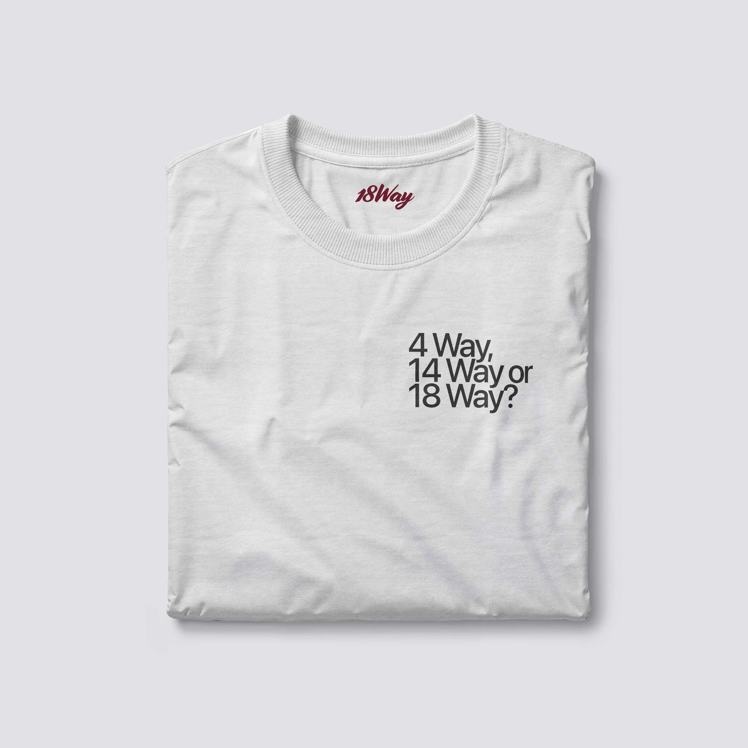 White 18Way T-shirt with black text reading "4 Way, 14 Way or 18 Way?" and a red logo inside the collar that says "18Way."