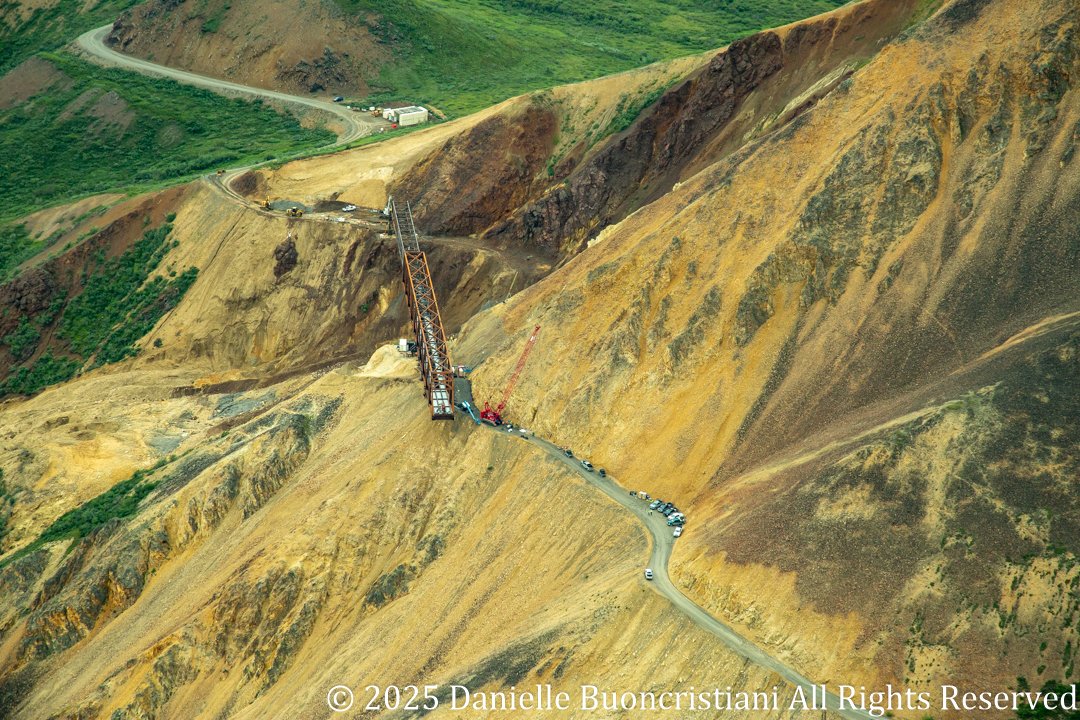 Pretty Rocks Landslide in Denali National Park showing an active slope failure and construction of a new bridge, which has closed the park road and requires visitors to fly into the interior.