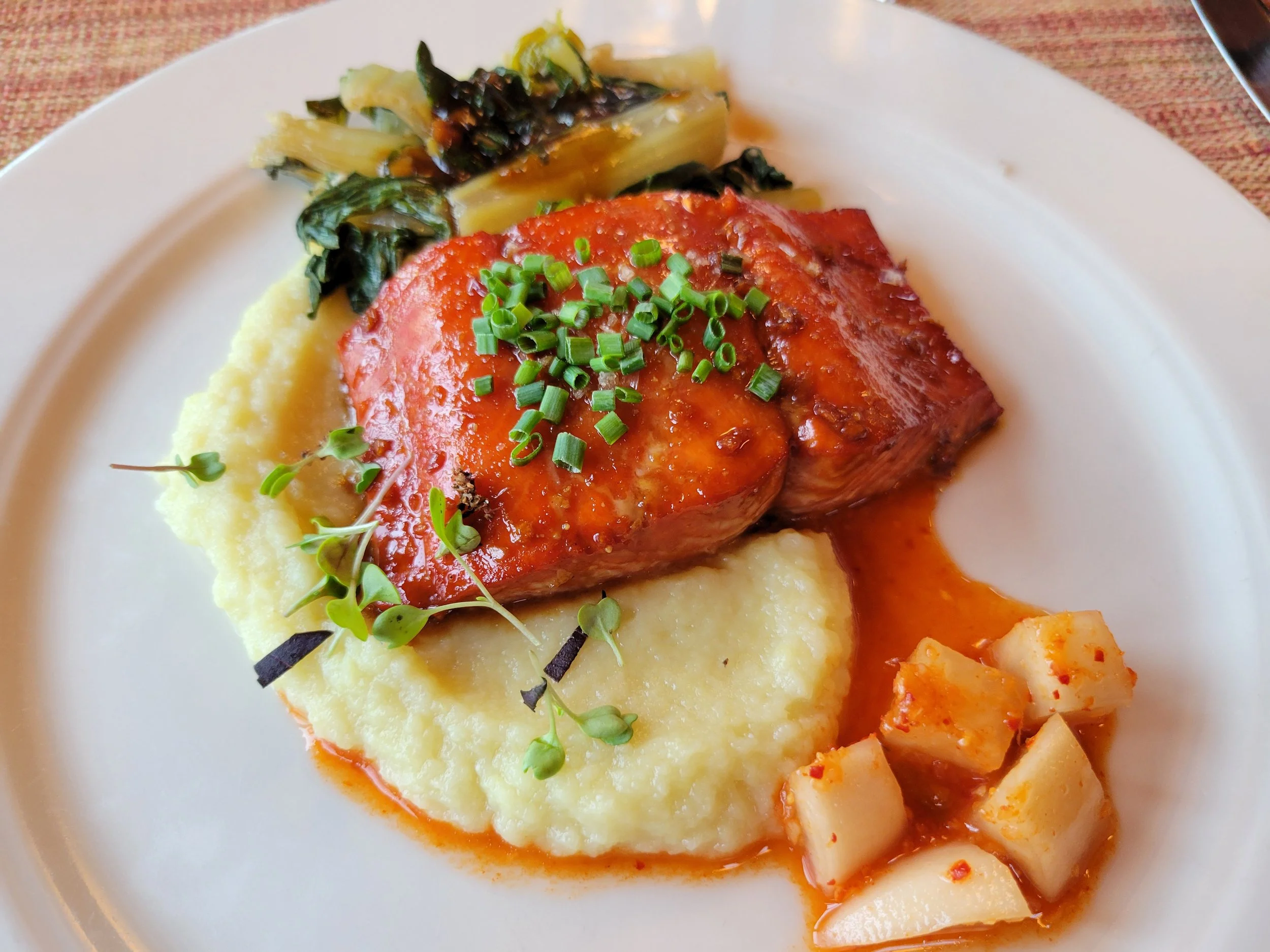 Salmon entrée served at Camp Denali with vegetables, sauce, and mashed potatoes prepared at the lodge.